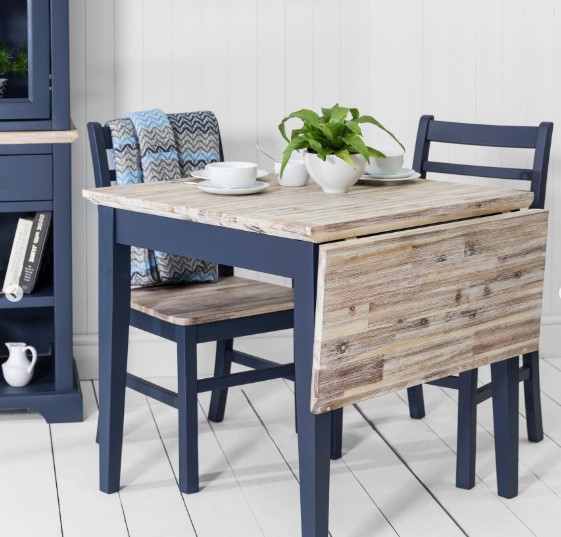 Blue drop-leaf table with natural wood top