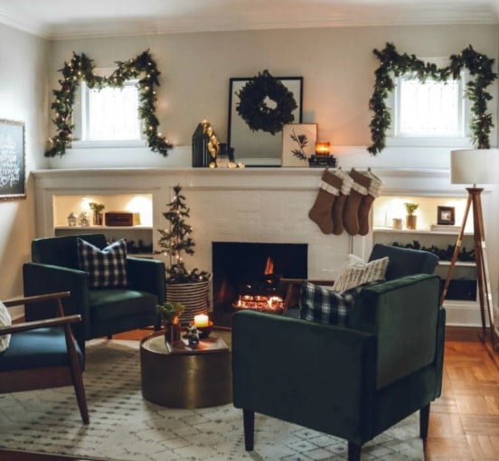 Cozy chairs around a fireplace