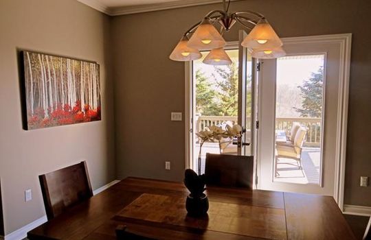3920-timber-green-ranch-home-dining-room-with-walkout-to-covered-deck-copy