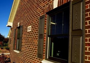 3920-timber-green-ranch-home-exterior-brick-with-shutters-copy