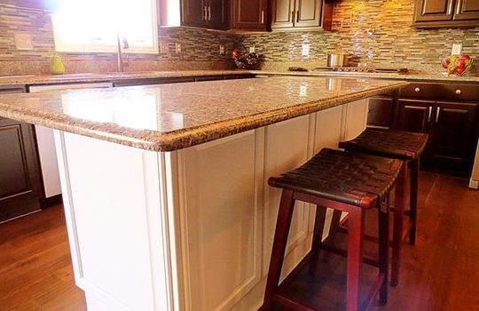 3920-timber-green-ranch-home-luxury-kitchen-with-island-snackbar-copy