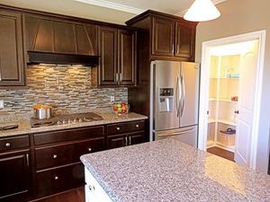 3920-timber-green-ranch-home-luxury-kitchen-with-walkin-pantry-copy
