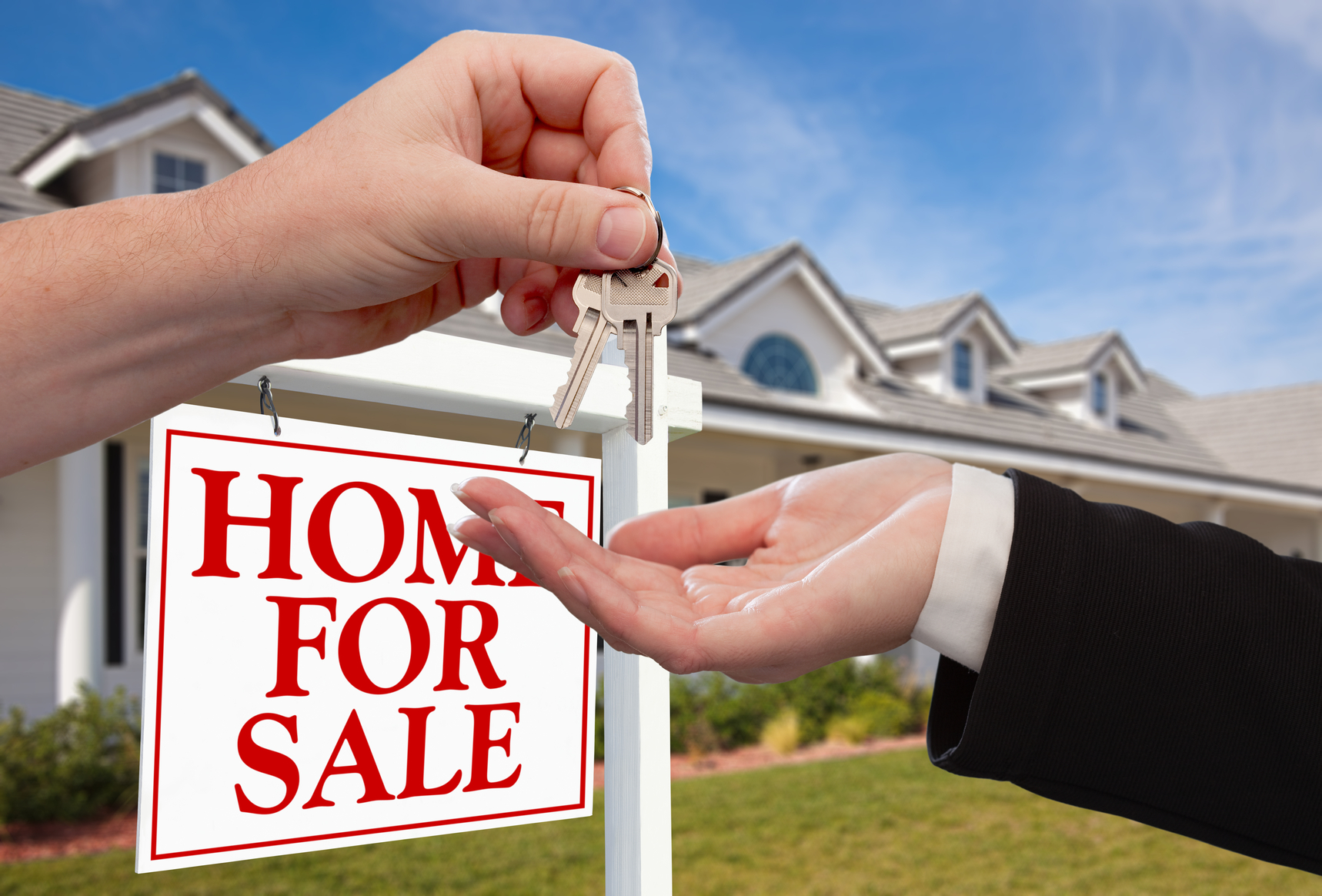 Handing Over the House Keys in Front of a Beautiful New Home. Five