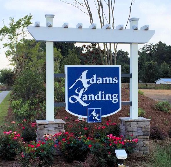 Adams Landing Entrance Sign The Cameron Team