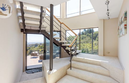 lowerlevelstairsleadinguptolivingroom38