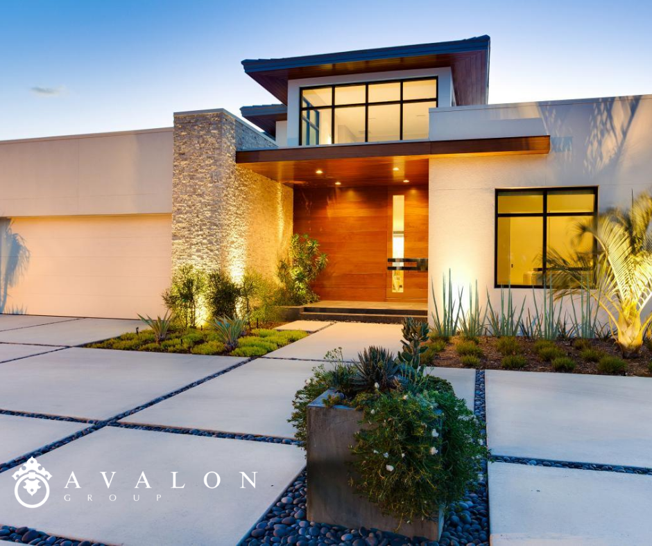 Moreover, the modern home with white stucco uses mulch in it's landscaping beds. Also between driveway pavers, mulch is used.