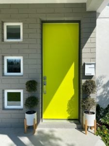 Again, the new chartreuse color is supper happy. It is surrounded by a brick wall painted gray brown.