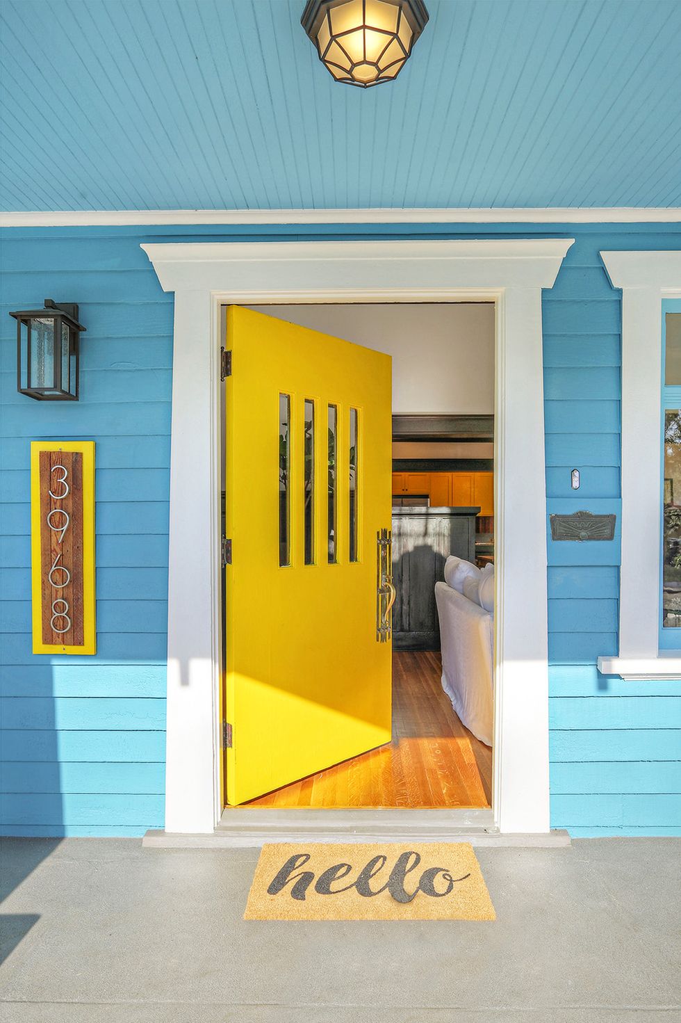 Cabin Fever Projects: Eight of our top 10 is Summer Sun Valspar 3007-2B. Moreover the door is primed with white and the siding is bright blue.