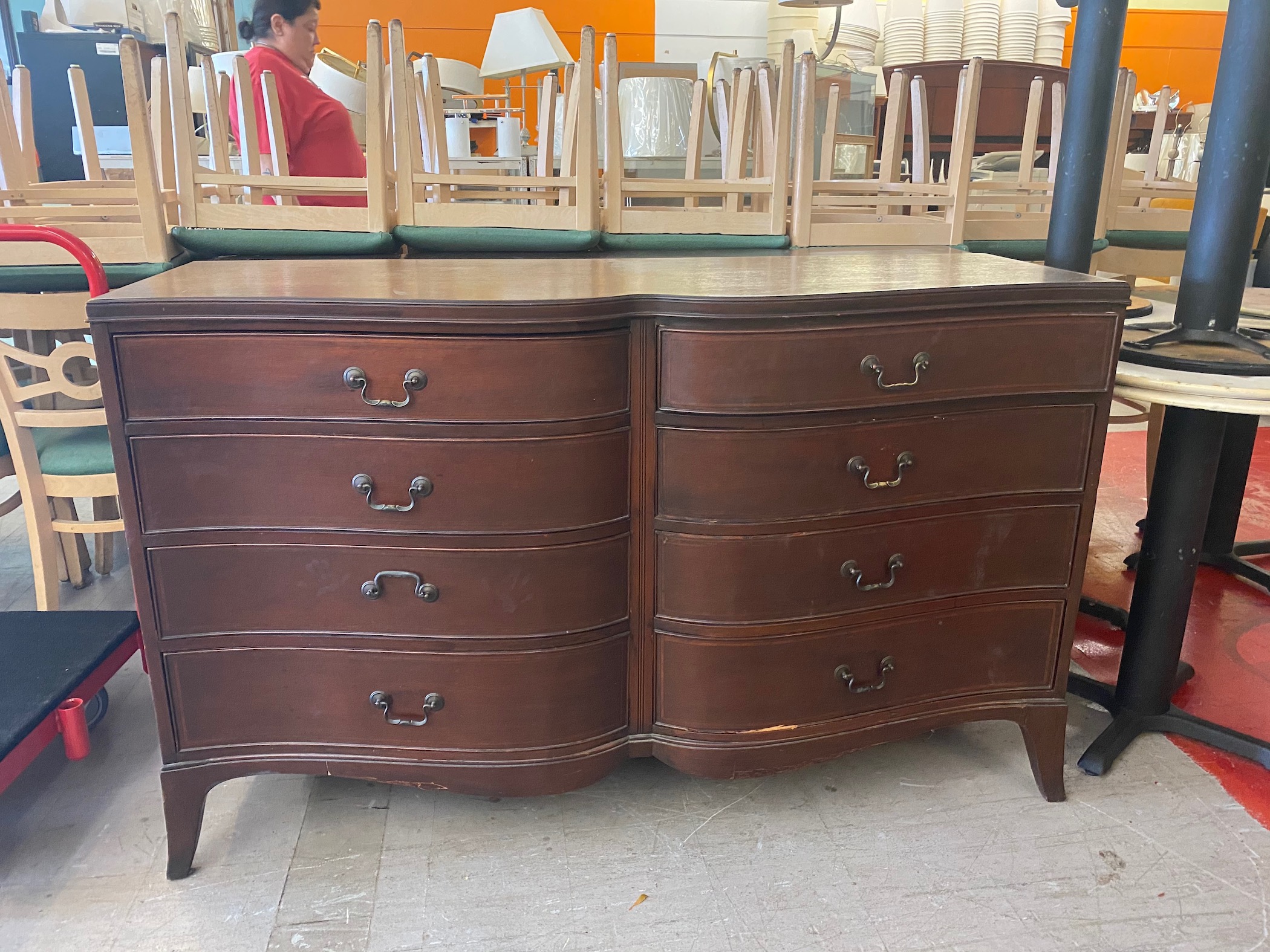Furthermore, there is an old beat up wood dresser in a store with upside down chairs in the background. We have found a perfect specimen for a Cabin Fever Project!